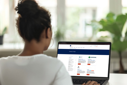 GS1 Graded Woman On Laptop With Partnerfinder
